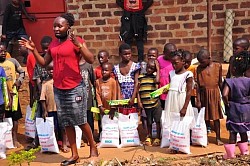 Goshen Ladies Miniseries helping Jireh Ministries Africa to give out rice to the needy