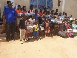 Goshen Ladies Miniseries helping Jireh Ministries Africa distribute milk to those in need