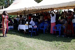 Gailey Mwesigwa leading prayer conference Kampala, Uganda